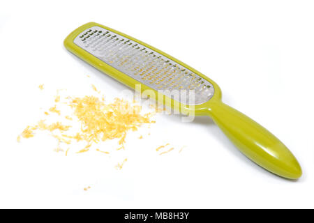 Grille en acier inoxydable zester et le zeste de citron, zeste isolé sur fond blanc Banque D'Images
