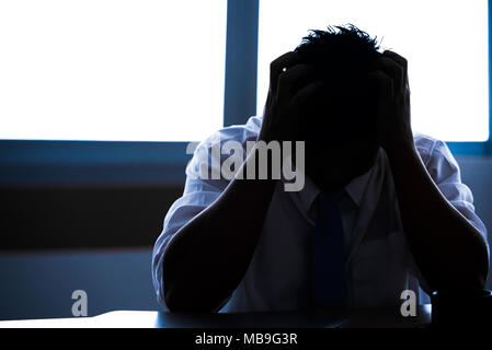 Affaires et silhouette horaire de travail, l'homme travailleur sérieux Banque D'Images