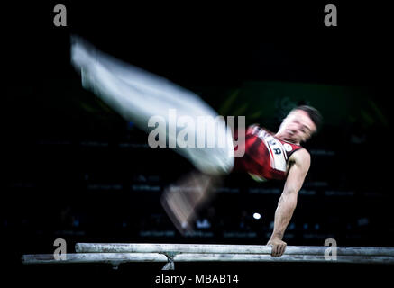 Rene Cournoyer du Canada pendant les Men's Parallel bars au centre sportif intérieur de Coomera pendant le cinquième jour des Jeux du Commonwealth de 2018 sur la Gold Coast, en Australie. Banque D'Images