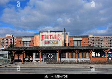 Ottawa, Canada - le 9 avril 2018 : chaîne de restaurants canadienne Montana's BBQ & Grill sur le chemin Merivale Road. Il était à l'origine qualifiés de Montana's Cookhouse, un Banque D'Images