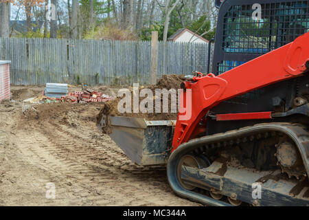 La construction d'immeubles industriels et de mise à niveau de bulldozer mini site déménagement voie sol-type bulldozer chargeuse pelleteuse machine Banque D'Images