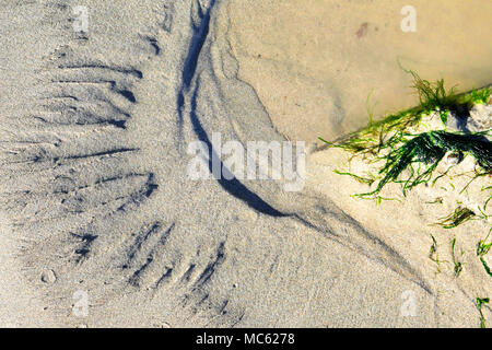 Les modèles et textures de sable. Banque D'Images