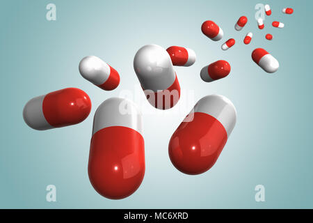 Le rendu 3D d'un groupe de médecine de gélules sur un fond bleu Banque D'Images