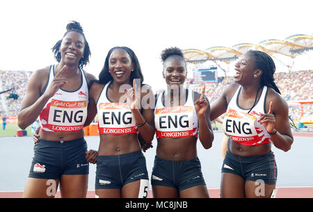 L'Angleterre (gauche-droite) Lorraine Ugen, Bianca Williams, Dina Asher-Smith et Asha Philip célébrer remportant la médaille d'or en 4x100m finale au stade de Carrare pendant dix jours des Jeux du Commonwealth de 2018 dans la Gold Coast, en Australie. Banque D'Images