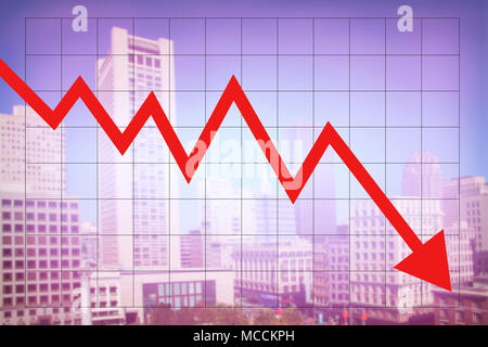 L'économie de marché de l'immobilier avec la diminution de la graphique et flèche rouge en baisse avec l'arrière-plan flou coloré cityscape Banque D'Images