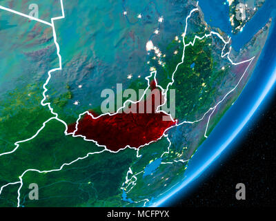 Le Soudan du Sud en rouge sur la planète terre dans la nuit avec des frontières visibles et les lumières de la ville. 3D illustration. Éléments de cette image fournie par la NASA. Banque D'Images