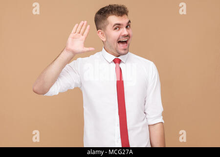 Happy happy bonjour, bonjour. Concept des gens d'affaires, bonnes et mauvaises émotions et sentiments. Studio shot, isolé sur fond marron clair Banque D'Images