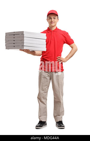 Portrait of a Teenage boy holding livraison boîtes à pizza isolé sur fond blanc Banque D'Images