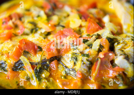 Close-up, abstraite de moqueca de poisson traditionnel brésilien ragoût. Profondeur de champ. Banque D'Images