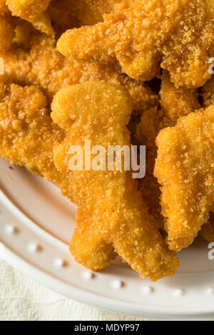 Les enfants en forme de dinosaures Nuggets de poulet prêt à manger Banque D'Images