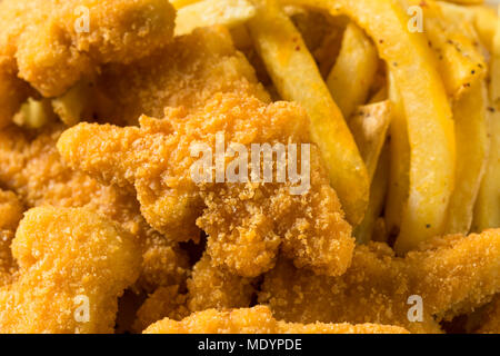 Les enfants en forme de dinosaures Nuggets de poulet prêt à manger Banque D'Images