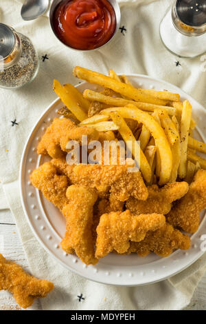 Les enfants en forme de dinosaures Nuggets de poulet prêt à manger Banque D'Images