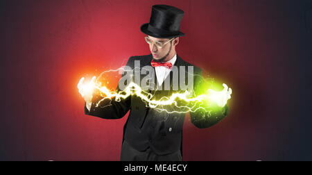 Mousseux magicien super power entre ses deux mains Banque D'Images