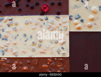 Fond chocolat. Le chocolat. Barre de chocolat. Chocolat de l'écrou. Banque D'Images