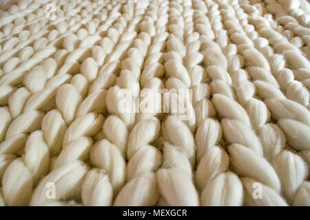 Plaid laine blanche, texture de près l'arrière-plan Banque D'Images