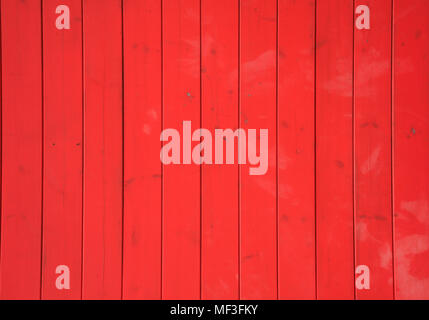 Fond rouge en bois avec des planches verticales. La surface vide vintage, vue en gros plan. Banque D'Images