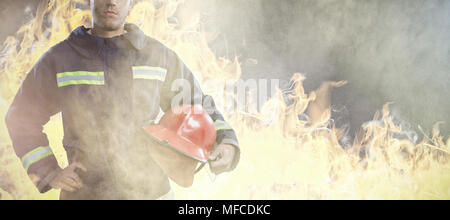 Composite image of fireman Banque D'Images