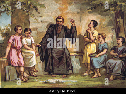 Saint Benoît de Nursie (480-547) Italien fondateur du monachisme chrétien. Mis en ordre des Bénédictins (Black Friars). Benoît l'enseignement aux enfants. La religion du xixe siècle Carte commerciales chromolithographie Banque D'Images