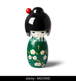 Poupée kokeshi traditionnel japonais isolé sur fond blanc Banque D'Images