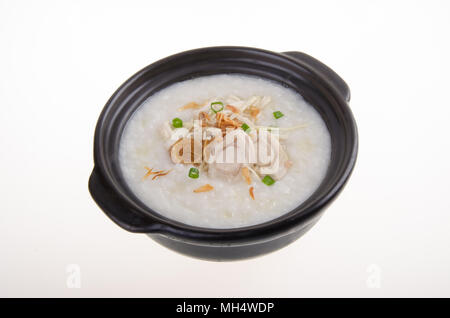 Le porridge, l'ormeau et poulet (porridge) servi en claypot congee Banque D'Images