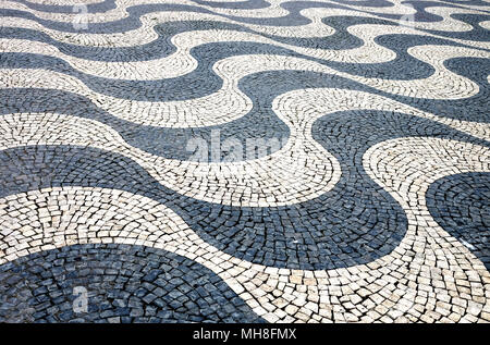 Vague de Lisbonne pavés mosaïque close up Banque D'Images