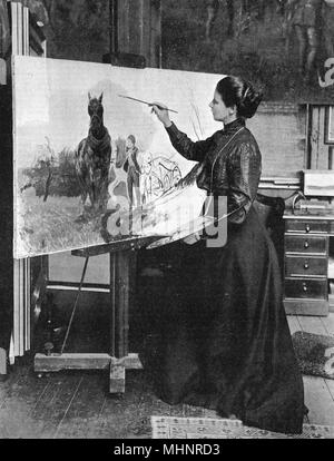 Lucy Kemp-Welch (1869 - 1958), artiste et peintre, principalement des sujets équestres, photographié dans son studio. Beauté noire illustrée. ainsi qu'un certain nombre d'affiches de la Première Guerre mondiale. Date : 1906 Banque D'Images