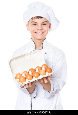 Teen boy wearing uniformes chef Banque D'Images