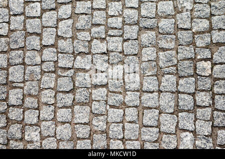 Vue de dessus d'une petite rue pavée. Banque D'Images