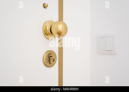 Bouton de porte et serrure d'or Banque D'Images