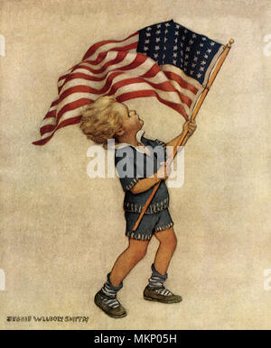 Boy waving American Flag Banque D'Images