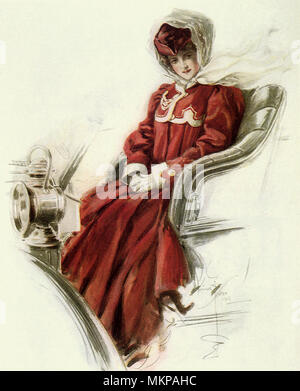 Femme en robe rouge assis dans l'Automobile Banque D'Images