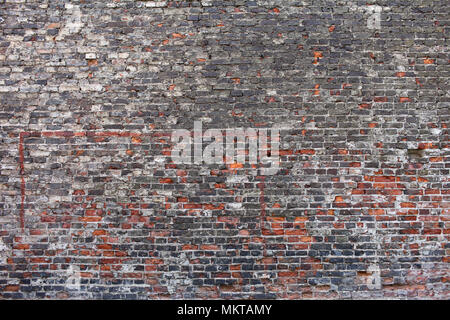 Très vieux mur de briques vieillies et contexte Banque D'Images