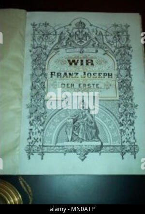 . Deutsch : Seite 1 aus dem Adelsdiplom von Franz Joseph I. (Kaiser von Österreich, 1830-1916) für den k.u.k. Generalmajor Josef Macalik (1853-1921) mit Prädikat dem Ivanobran "von". Ausgestellt am 10. Dezember 1914 in Wien, eigenhändige Unterschrift des Kaisers. Texte kalligraphierter Pergamentlibell, mit Adelswappen farbig handgemaltem anhängendem kaiserlichem, komplett mit en Wachssiegel Messingkapsel. Dans Blechschatulle. . 10 décembre 1914. FrostiDerStifter Adelsdiplom Macalik Ivanobran Josef von (1914) 02 Banque D'Images