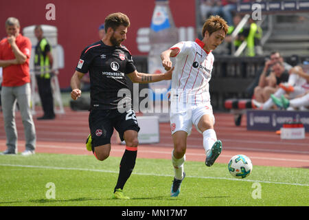 Nuremberg, Allemagne. 13 mai, 2018. Genki HARAGUCHI (Fortuna Düsseldorf), Action, les duels contre Enrico VALENTINI (1.FC Nuremberg), Soccer 2. 1.Bundesliga/Nuremberg-Fortuna FC 2-3, Düsseldorf 34.journée, journée34, Ligue2 saison 2017/18, à 13.05 .2018 Max Morlock Stadium. Utilisation dans le monde entier | Credit : dpa/Alamy Live News Banque D'Images