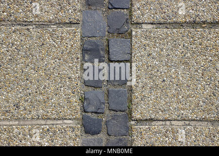 Trottoir de pavés de galets galets ou la texture d'arrière-plan Banque D'Images