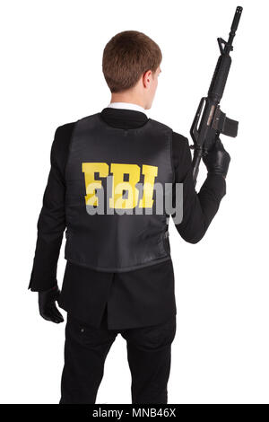 L'agent du FBI au fusil isolated on white Banque D'Images