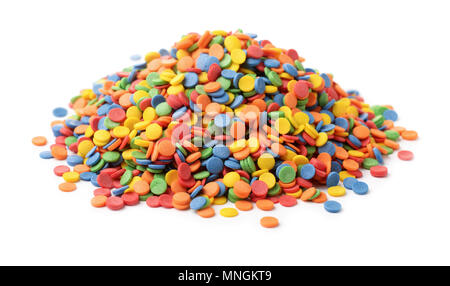 Tas de confettis ronds candy sprinkles isolated on white Banque D'Images