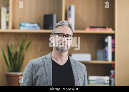 Portrait of businessman in creative office Banque D'Images