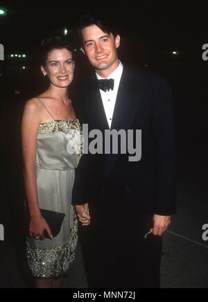 PASADENA, CA - le 16 septembre : (L-R) L'actrice Lara Flynn Boyle et l'acteur Kyle MacLachlan assister à la 42e Primetime Emmy Awards en septembre 16,1990 au Pasadena Civic Auditorium à Pasadena, en Californie. Photo de Barry King/Alamy Stock Photo Banque D'Images