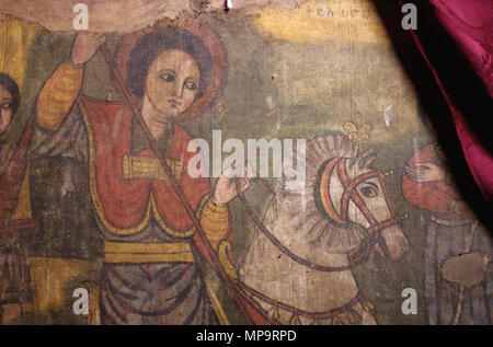 . EDIT : Les peintures de l'église de Lalibela date au 12ème-13ème siècle. Voir la source suivante : Teferi, Dawit (2015) [1995], "Une histoire de l'église éthiopienne de la technique", en Briggs, Philip, l'Éthiopie, Chalfont St Peter : Bradt Travel Guides, p. 242, ISBN 978-1-84162-922-3. Ce n'est qu'une partie d'un panel représentant saint Georges terrassant le dragon. Cette photo se concentre sur la rue George, son perky cheval, et sa lance. Pouvez-vous deviner ce qui est dans la photo suivante ? Parce que Saint Georges est le saint patron de l'Ethiopie, peintures illustrant cette histoire sont trouvés dans la plupart des églises orthodoxes chrétiens éthiopiens. Cependant, ce p Banque D'Images
