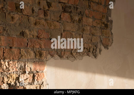 Mur de briques et plâtré Banque D'Images