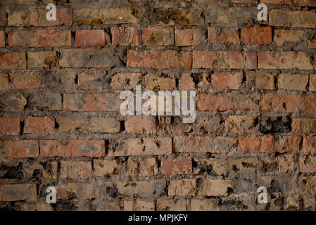 Le mur de briques avec coutures brodées Banque D'Images