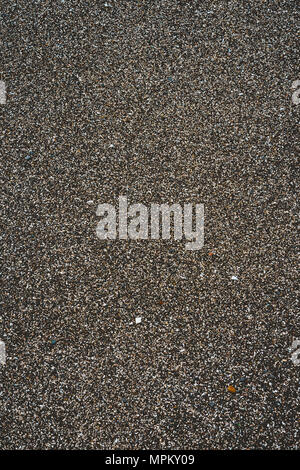 Schéma de la texture du sable noir volcanique de scintillement. Le Cap Vert. Banque D'Images