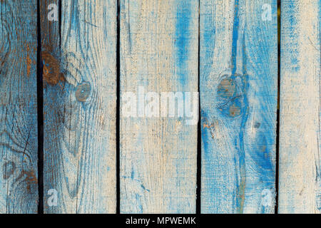 La texture d'un vieux mur peint en bleu en bois Banque D'Images