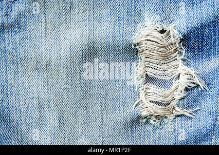 La texture de l'absence de jeans et jeans bleu sur plancher en bois, jeans, texture de jeans. Banque D'Images