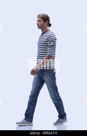 Vue de côté.young man va de l'avant. Banque D'Images