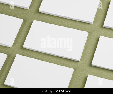 Maquette de cartes d'affaires horizontales stacks disposés en rangées au fond texturé vert Banque D'Images