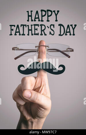 Happy father's day concept. Close up of male part avec une paire de lunettes et une moustache formant un visage de l'homme. Banque D'Images