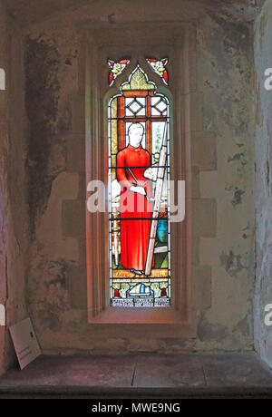 Un vitrail commémoratif dans le choeur de l'église paroissiale de Horsey, Norfolk, Angleterre, Royaume-Uni, Europe. Banque D'Images