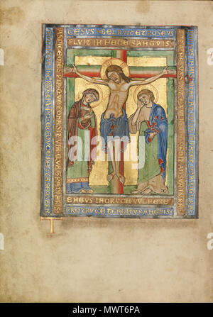 . English : T Initial : La Crucifixion ; inconnu ; Steinfeld, Allemagne ; environ 1180 Tempera ; couleurs, or, argent, et de l'encre sur parchemin ; Feuille : 25,2 x 17,9 cm (9 15/16 x 7 1/16 in.) ; Mme Ludwig V 4, fol. 67v . vers 1180. 575 Missel Steinfeld inconnu T Banque D'Images